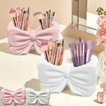 Bow brush holder